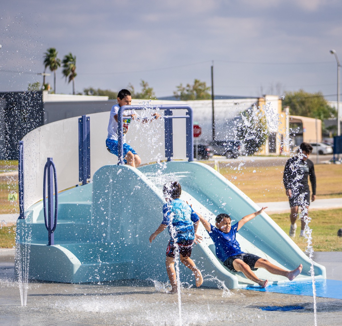 Children playing at the Pacific Trails splash pad