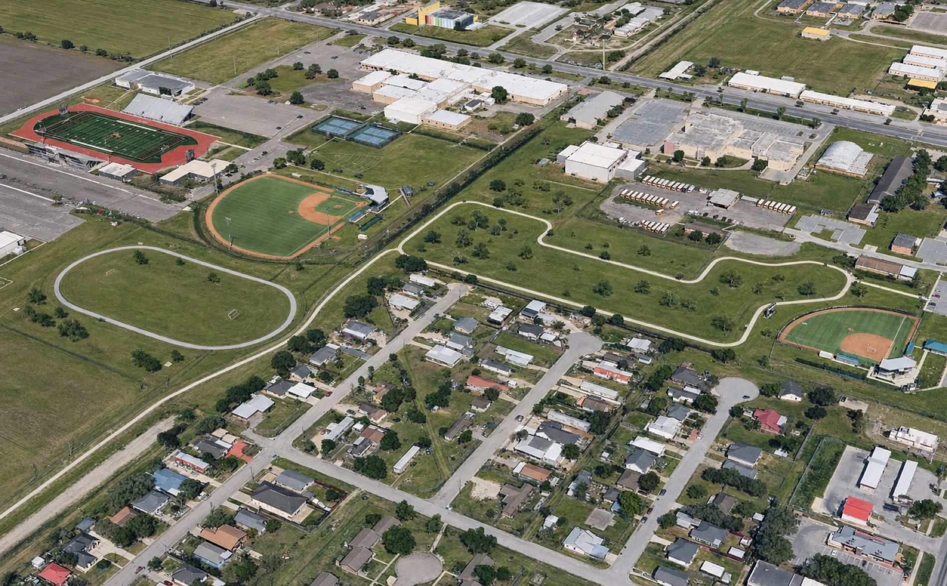 Aerial render of the Pacific Trails walking loop connecting Mario Leal Park, the neighborhood, and the high school